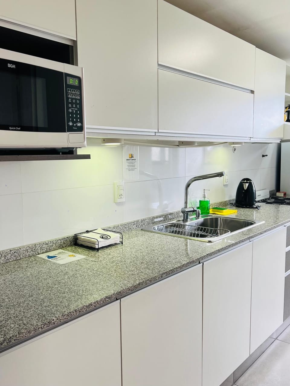 Kitchen or kitchenette, stove, toaster