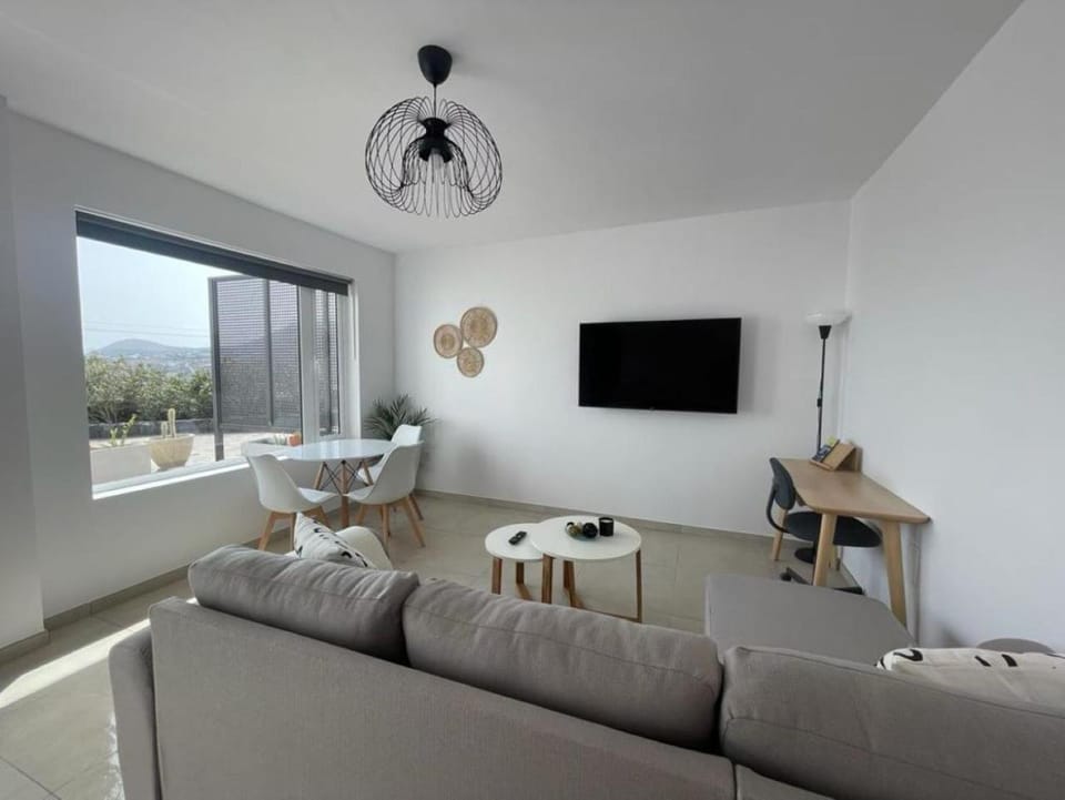 TV and multimedia, View (from property/room), Living room, Seating area, Dining area, Garden view, Mountain view, Sea view