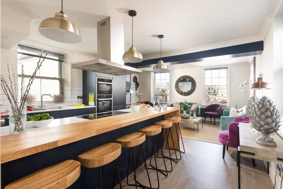 Kitchen or kitchenette, Living room, Seating area, Dining area, oven, stove, toaster