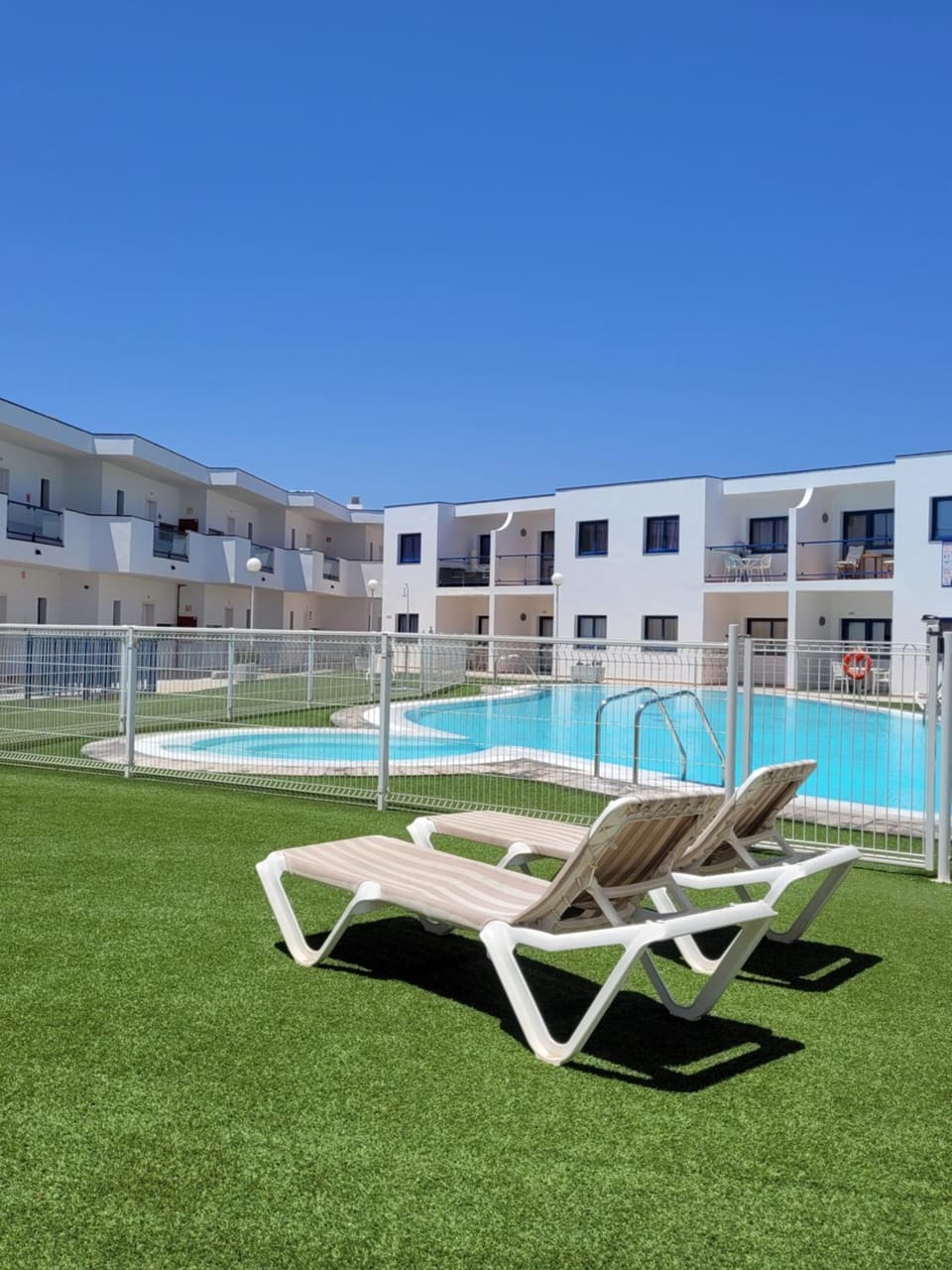 Property building, Pool view, Swimming pool, sunbed