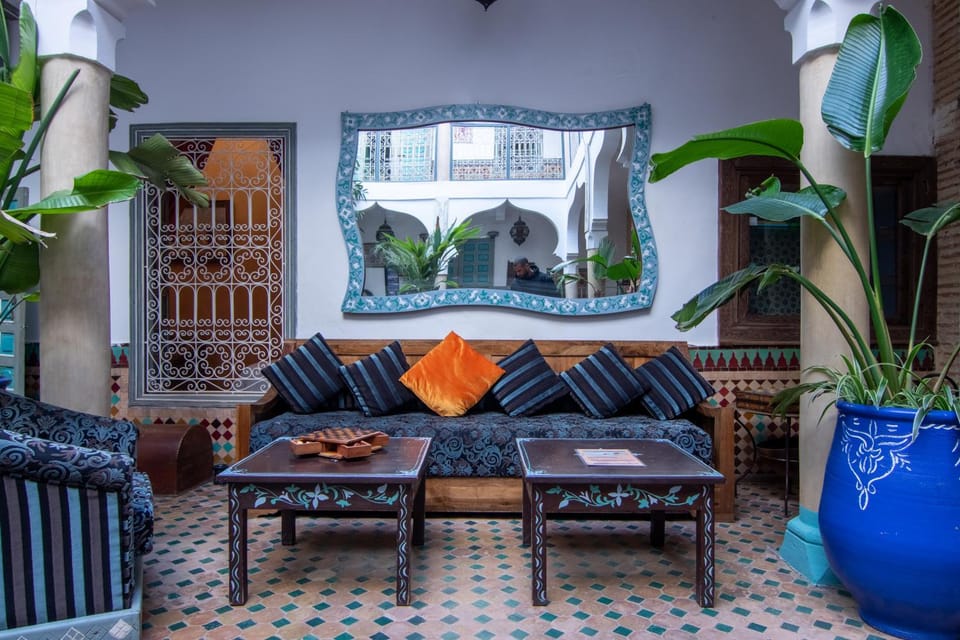 Property building, Patio, Living room, Seating area