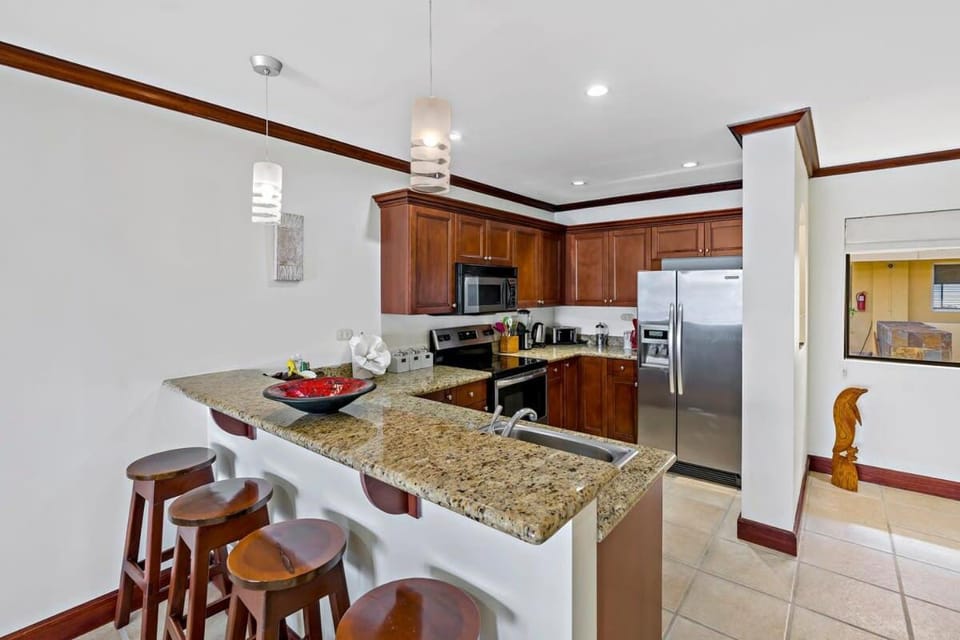 Remodeled Top-Floor Condo with Stunning Wrap-Around Balcony Offering Mountain, Ocean & Marina Views House in Playa Flamingo