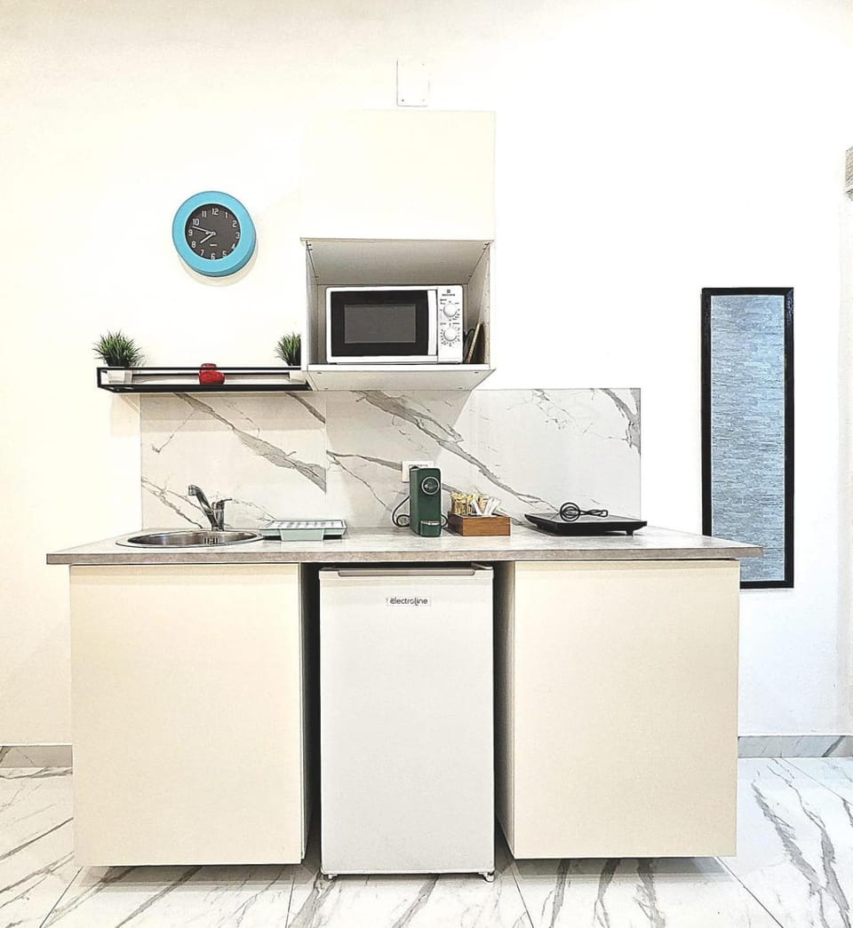 Kitchen or kitchenette, stove