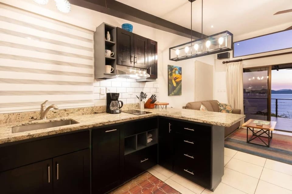 Modern Studio Apartment with Covered Balcony, Full Kitchen, and Stunning Ocean Views Apartment in Playa Flamingo