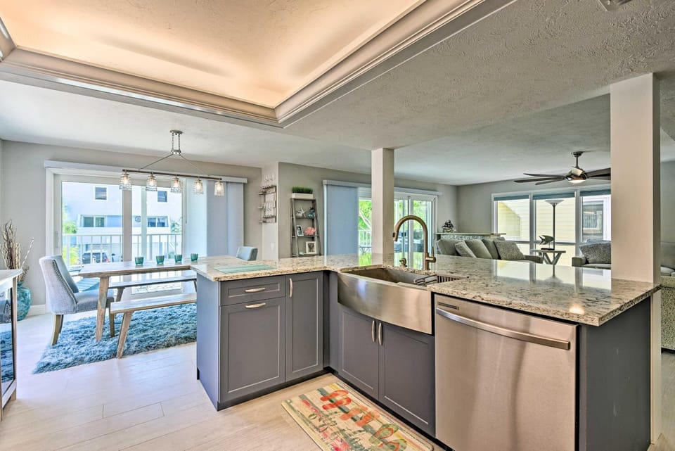Kitchen or kitchenette, dishwasher, oven, stove