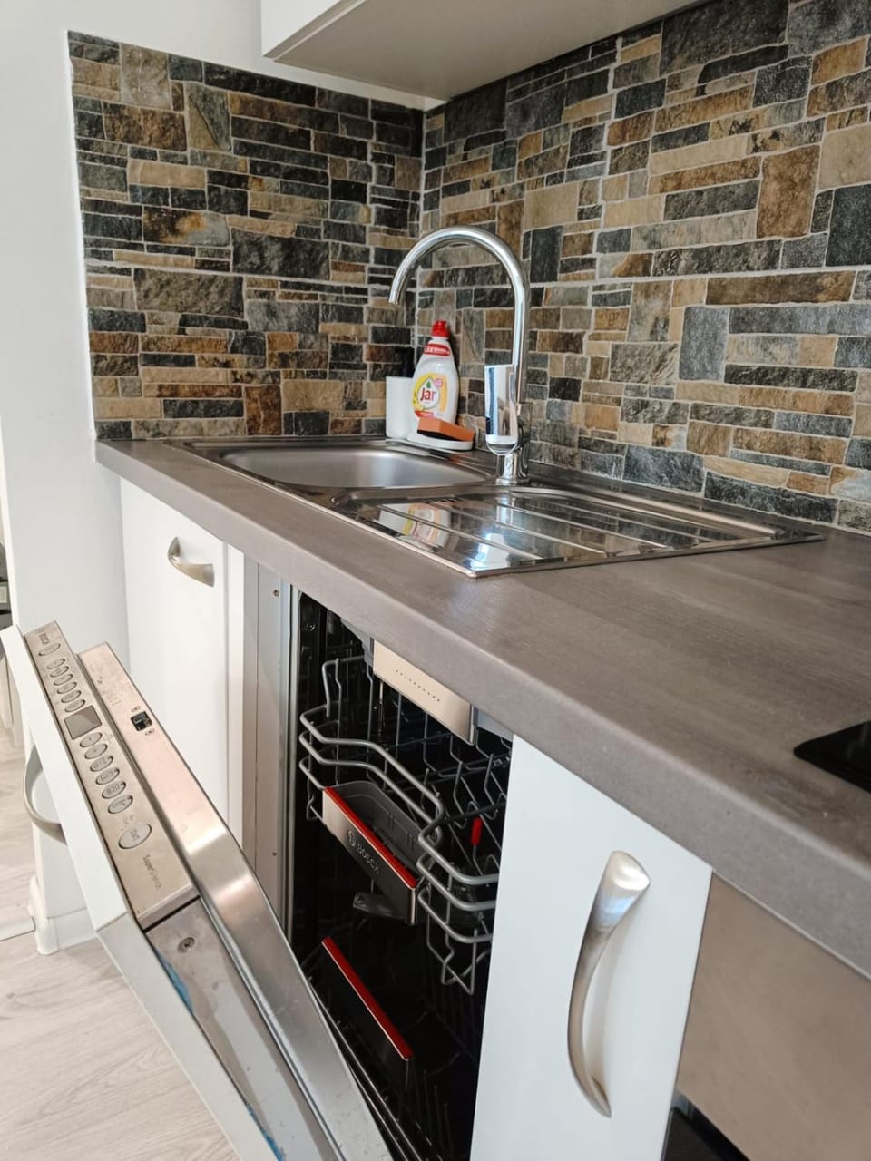 Kitchen or kitchenette, stove