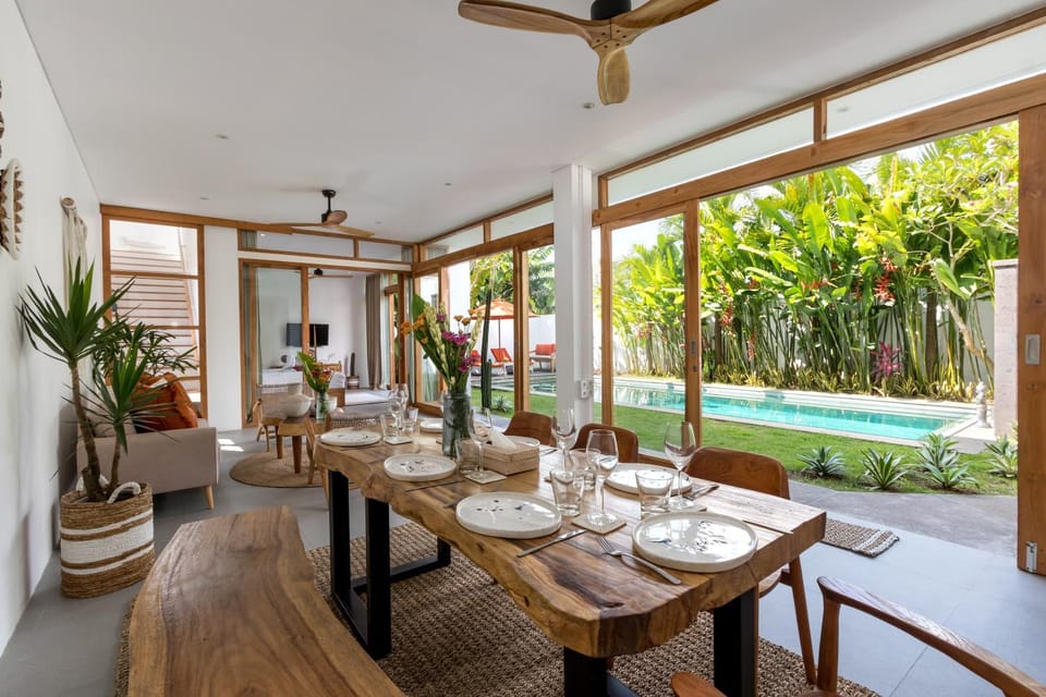 Living room, Seating area, Dining area, Garden view, Pool view