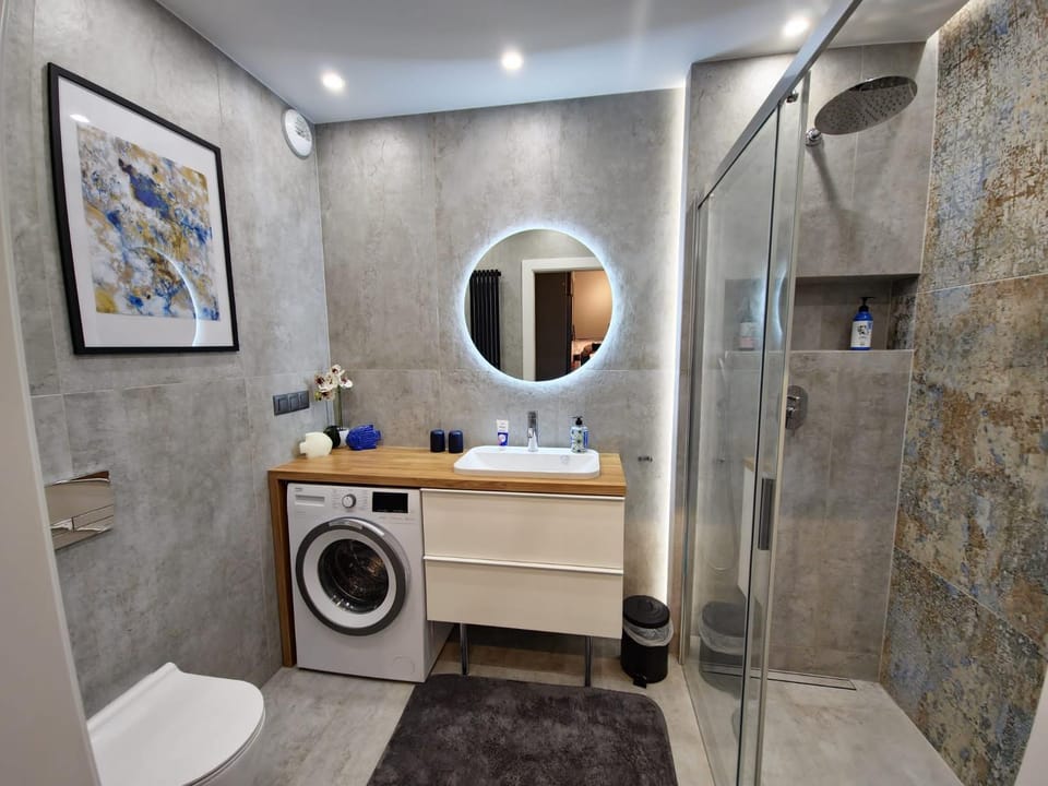 Shower, Toilet, Bathroom, hair dryier, washing machine