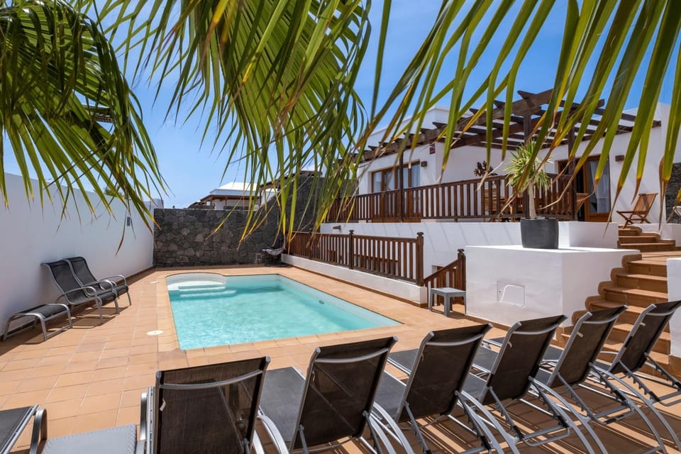 Property building, Living room, Swimming pool