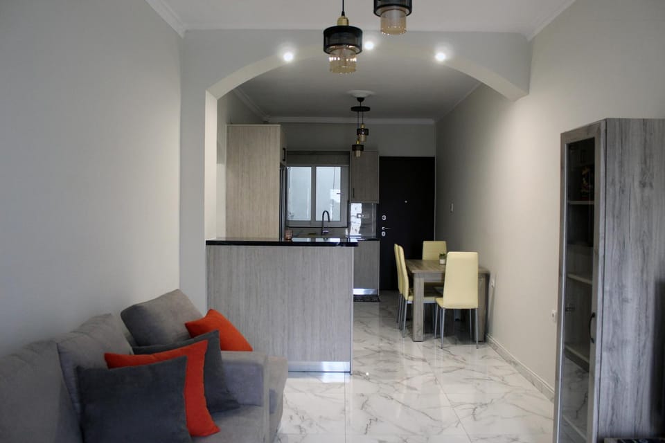 Kitchen or kitchenette, Living room, Seating area, Dining area