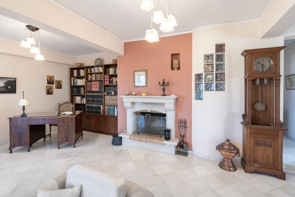 Library, Living room, Seating area, fireplace
