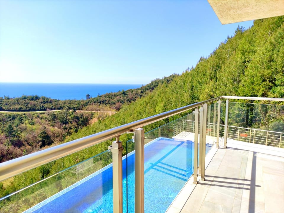 View (from property/room), Balcony/Terrace, Mountain view, Pool view, Sea view, Swimming pool