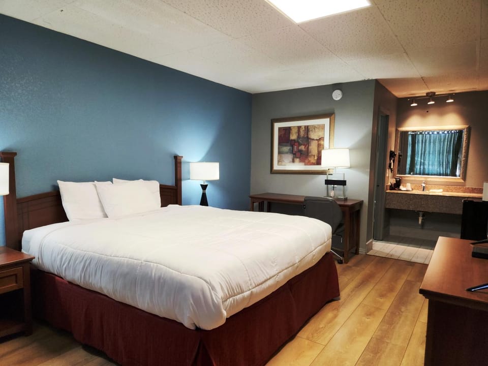 Bed, Bathroom, Seating area, Bedroom