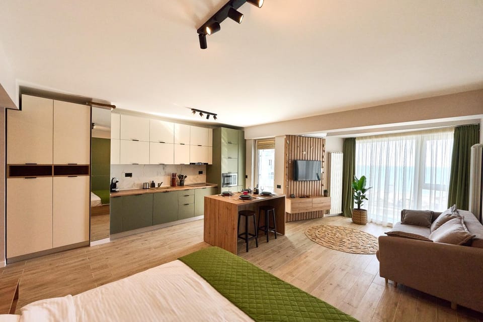 Bed, TV and multimedia, Coffee/tea facilities, Kitchen or kitchenette, Living room, Photo of the whole room, Seating area, Dining area, Bedroom, stove, wardrobe