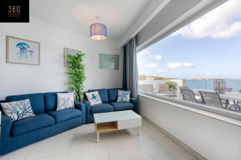 Seafront property with beautiful views & outdoor by 360 Estates Apartment in Saint Paul's Bay