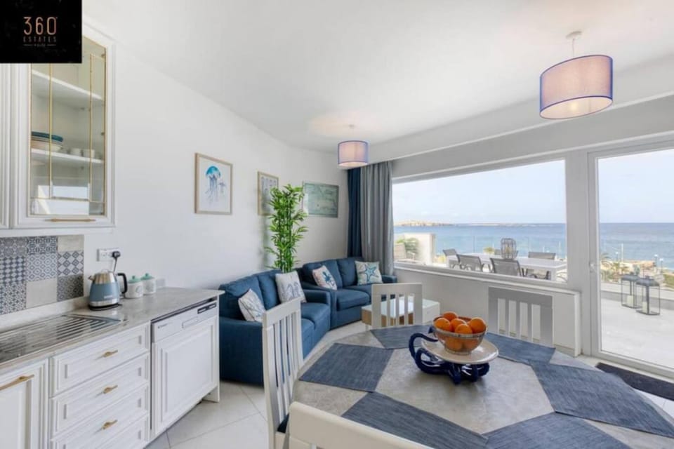 Seafront property with beautiful views & outdoor by 360 Estates Apartment in Saint Paul's Bay