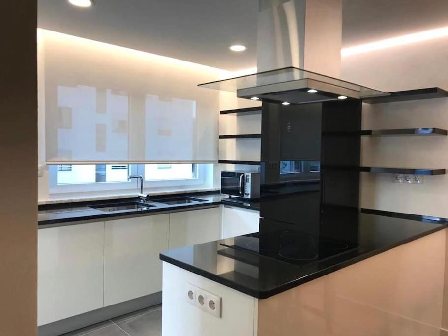 Kitchen or kitchenette, oven