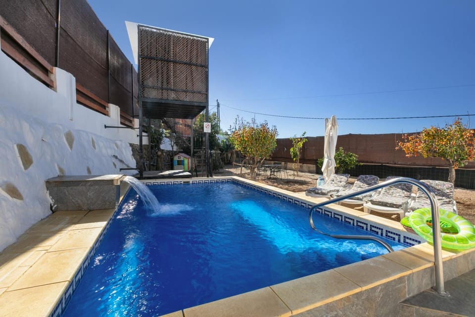 Property building, Living room, Swimming pool