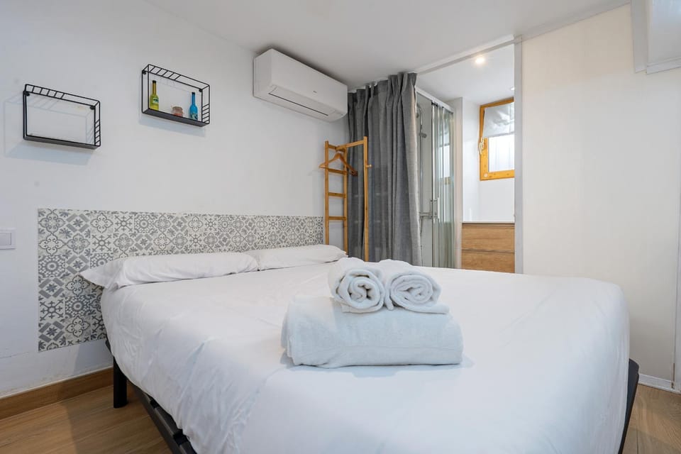 Bed, Photo of the whole room, Bedroom, towels, air conditioner