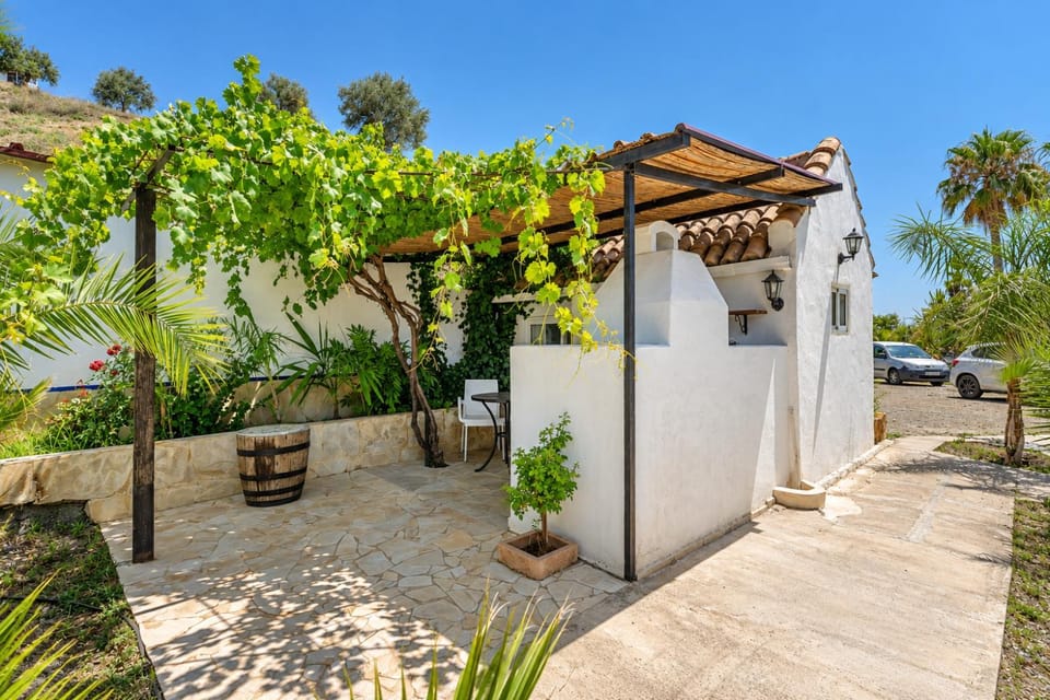Tiny house 12m2 "ANTON PIECK" in holiday park with 55 m2 pool House in Sierra de las Nieves