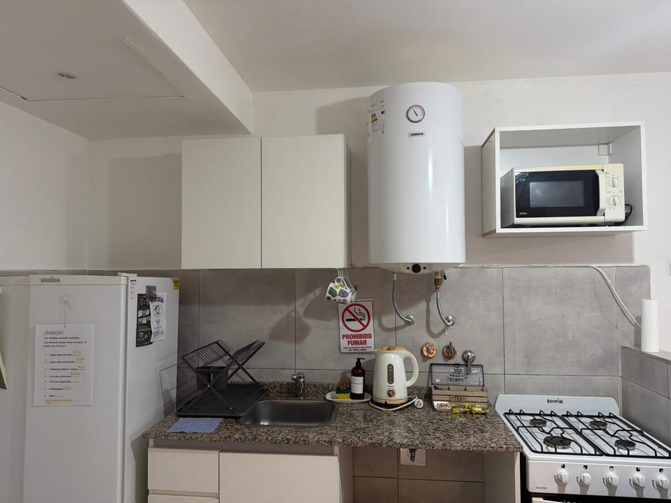 Mini holiday dpto , no fumar opción cochera,costo adicional Apartment in Rosario