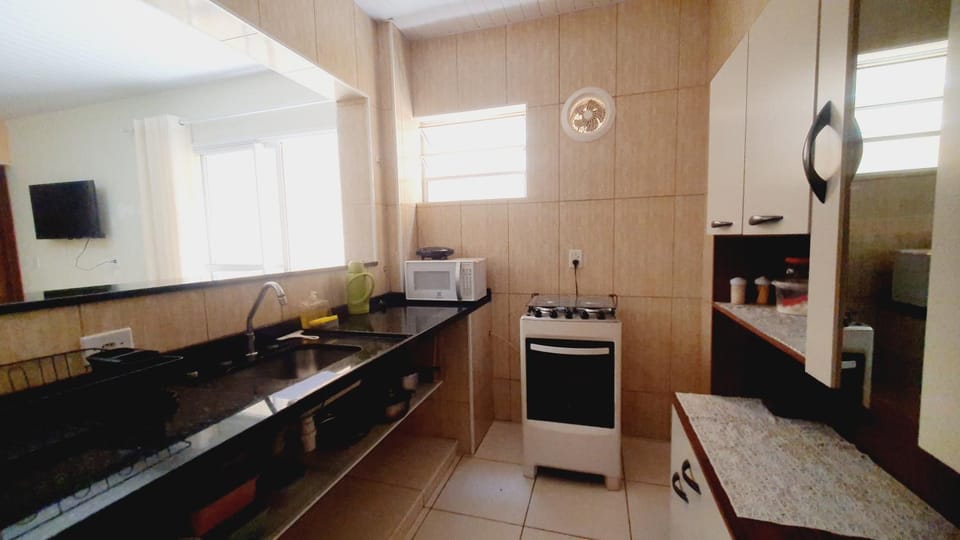 Kitchen or kitchenette, oven, stove