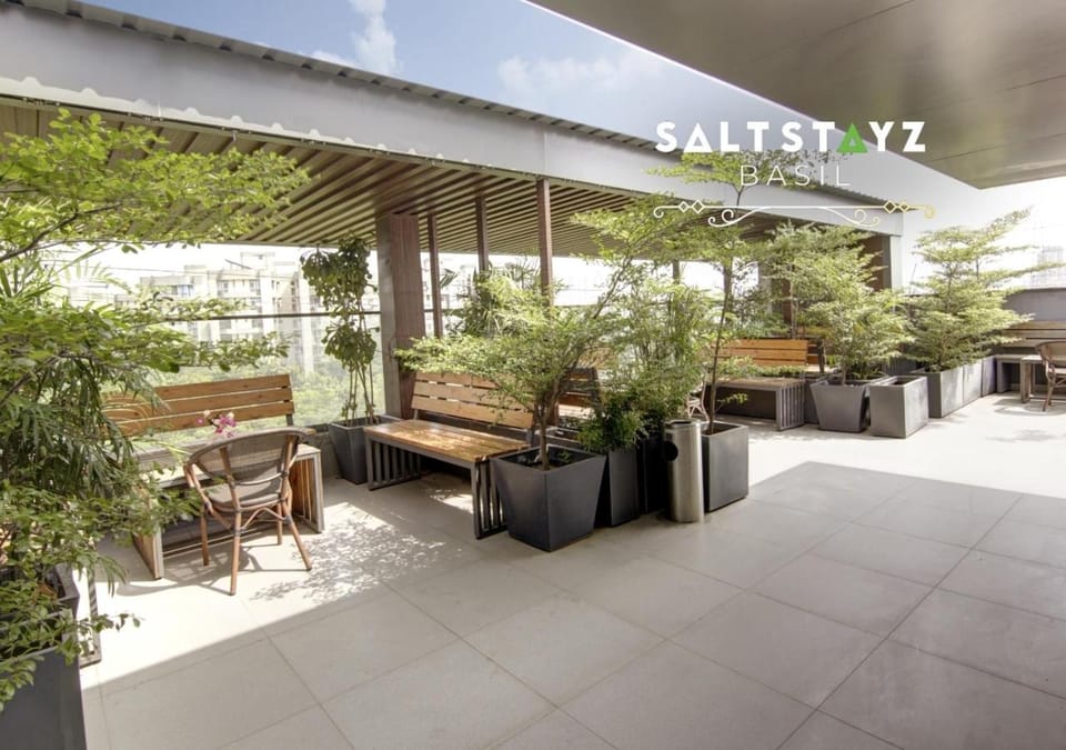 Day, Property logo or sign, Garden, View (from property/room), Balcony/Terrace, Seating area, Text overlay, Garden view