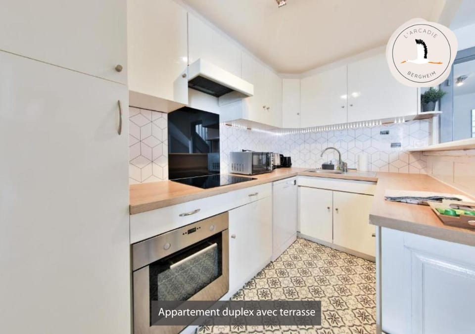 Kitchen or kitchenette, dishwasher, oven, stove, toaster