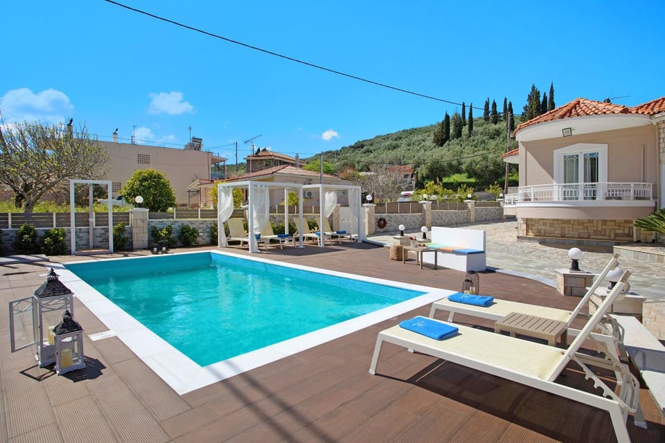 Property building, Living room, Swimming pool