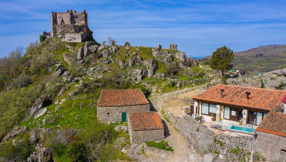 Property building, Nearby landmark, Day, Natural landscape, Landmark view, Mountain view