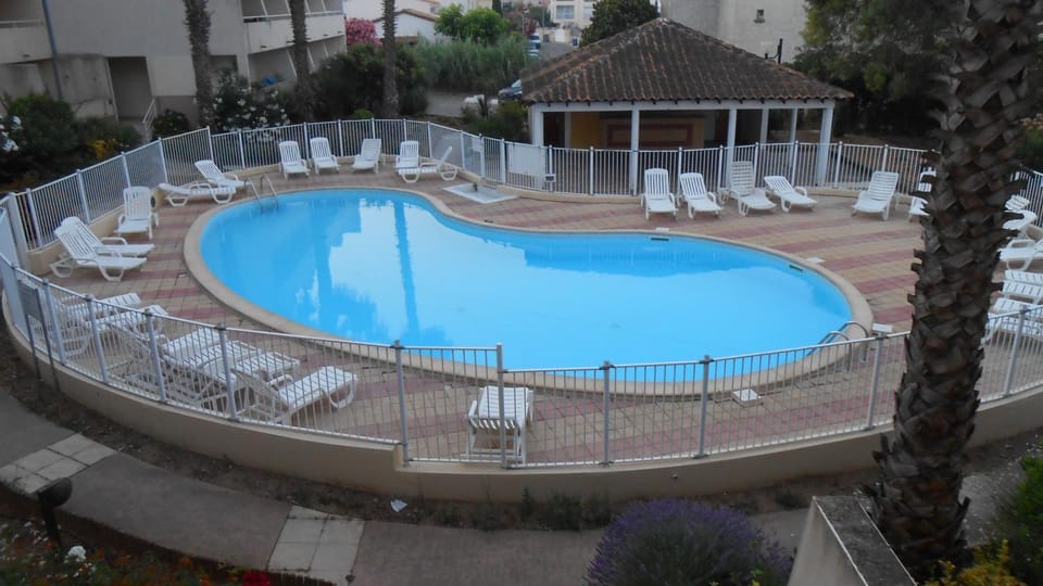 Property building, Living room, Swimming pool