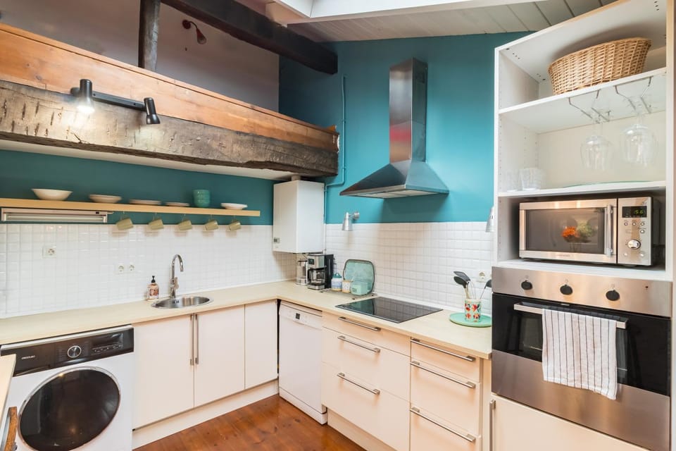 Kitchen or kitchenette, dishwasher, heating, microwave, oven