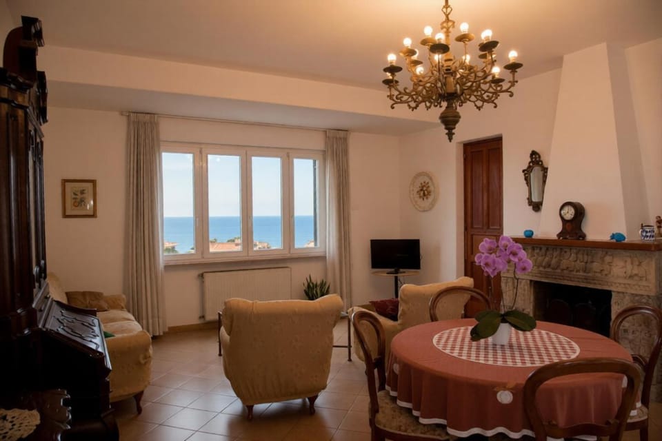 Natural landscape, TV and multimedia, Living room, Seating area, Dining area, Sea view