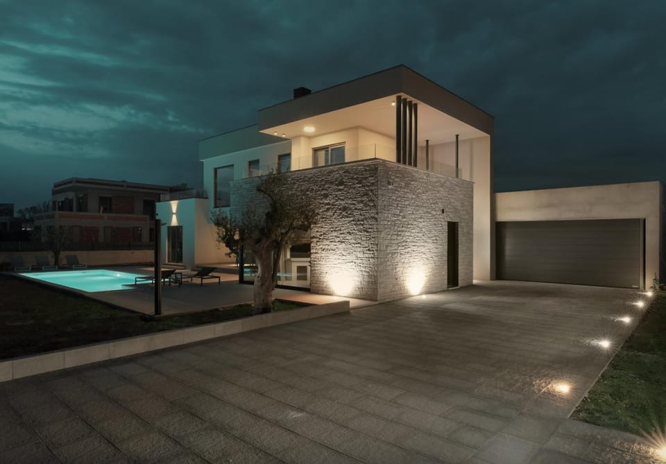 Property building, Patio, Night, Pool view, Swimming pool