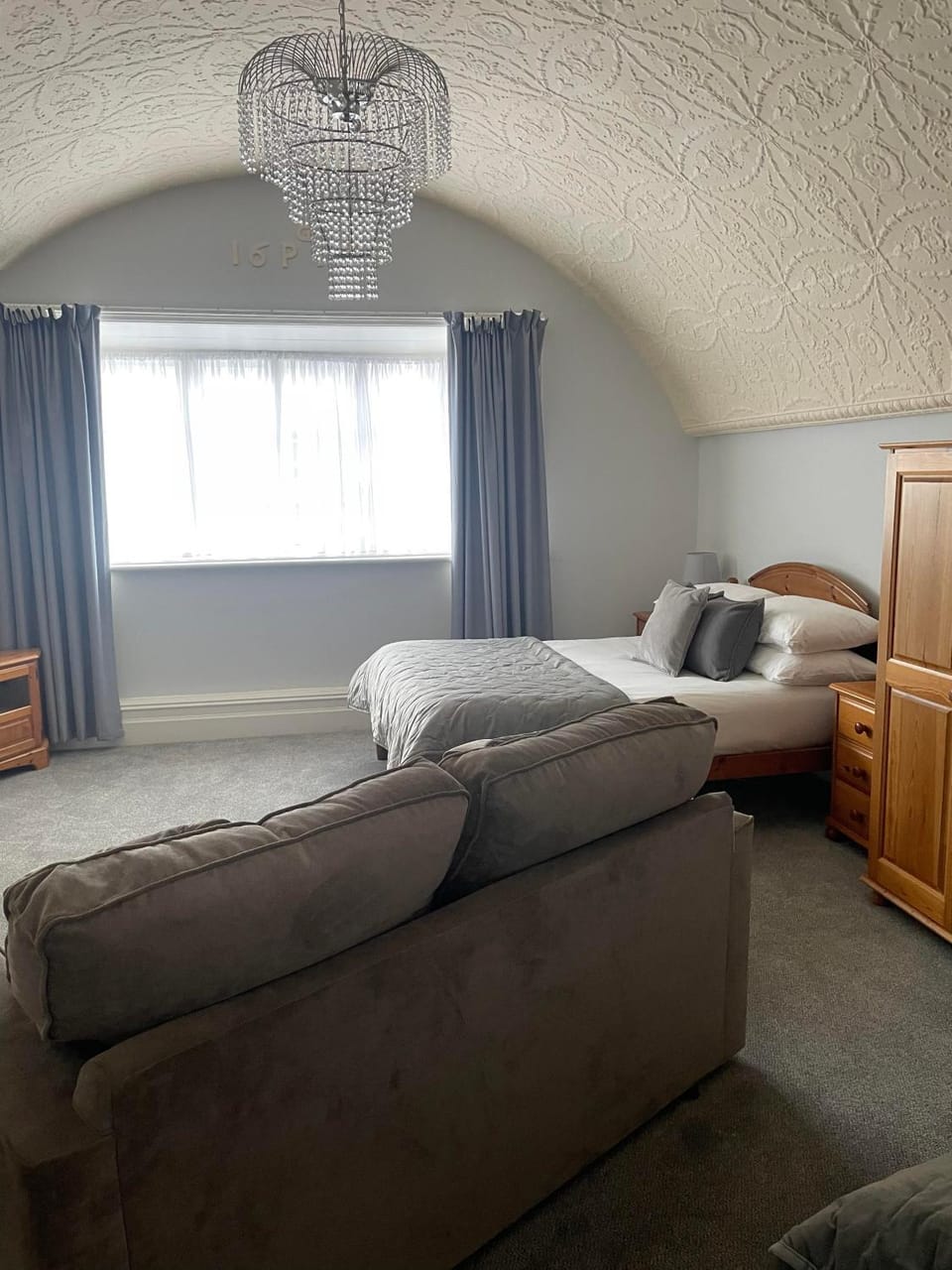 Bed, Living room, Seating area, Bedroom