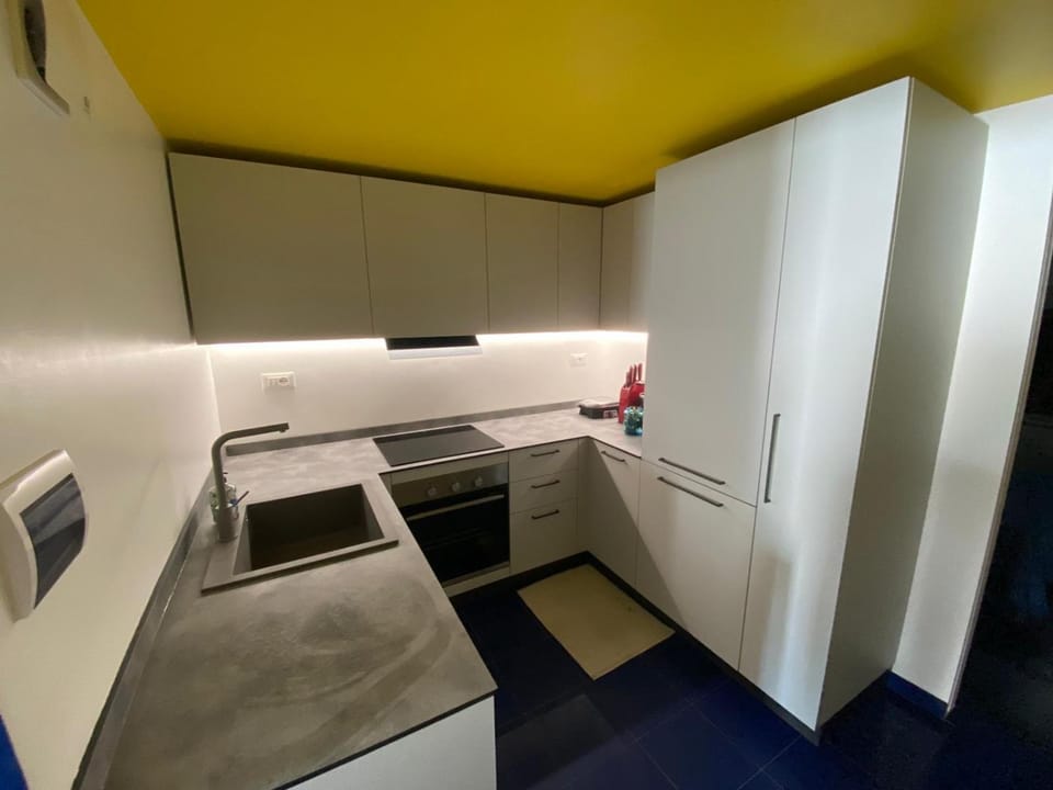 Kitchen or kitchenette, oven, stove