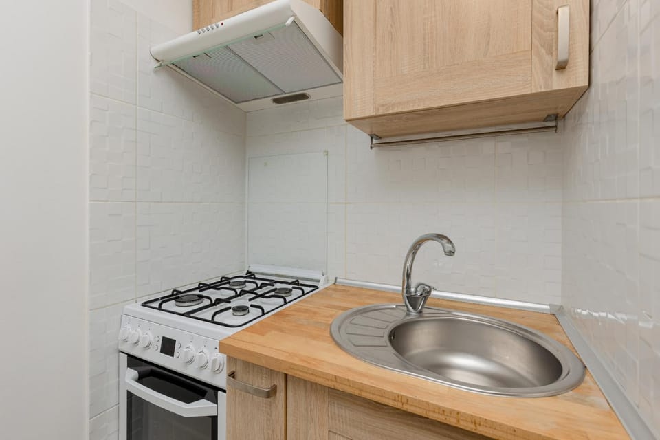 Kitchen or kitchenette, stove