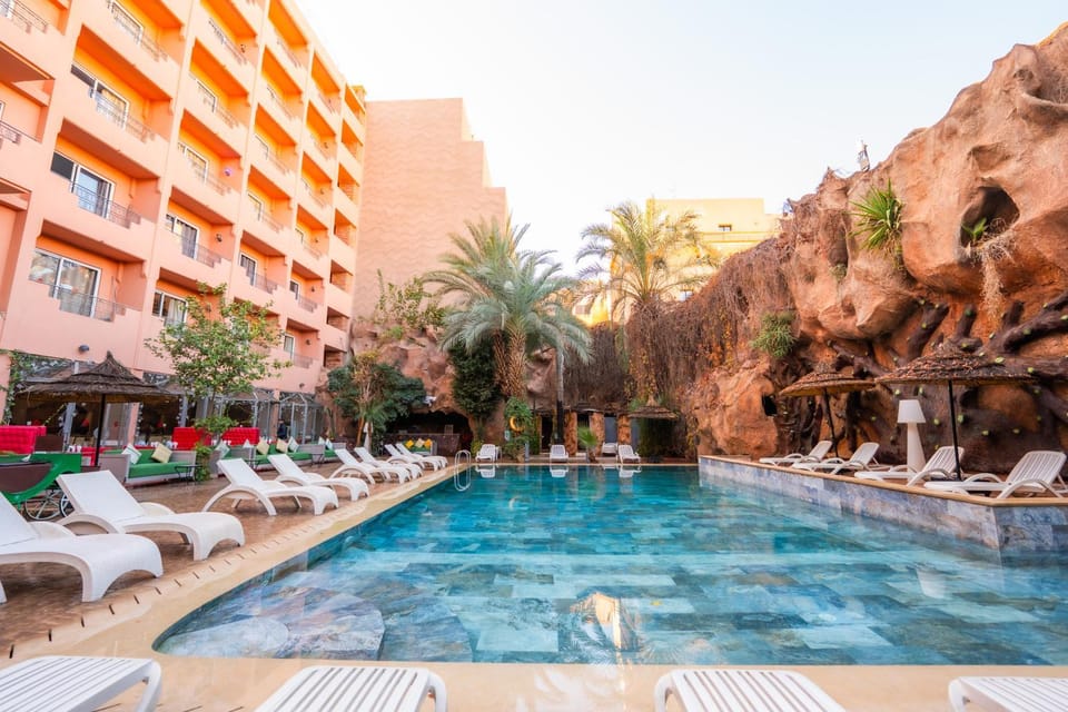 Property building, Patio, Day, Natural landscape, Pool view, Swimming pool, Swimming pool, sunbed
