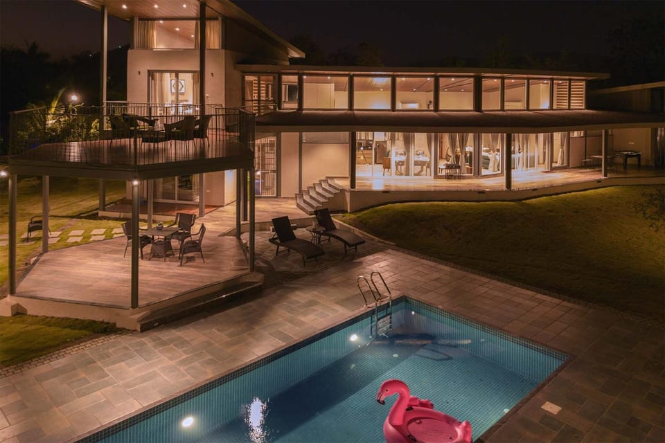 Property building, Patio, Night, Pool view, Swimming pool, Swimming pool