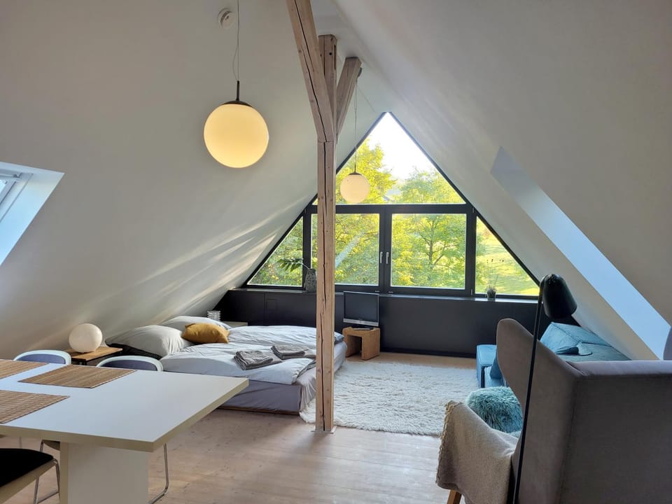 Bed, Living room, Seating area, Bedroom