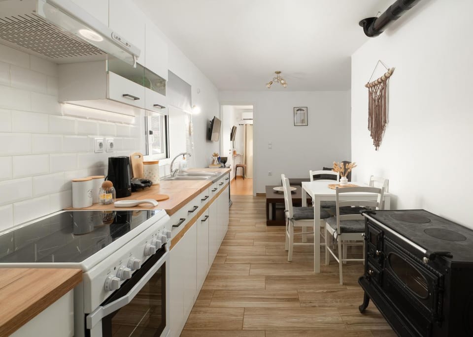 Living room, Dining area, oven, stove, air conditioner
