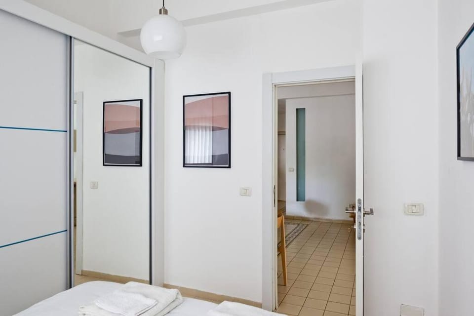 Renovated 2BR with Balcony in Bauhaus *Beachfront* Apartment in Tel Aviv-Yafo