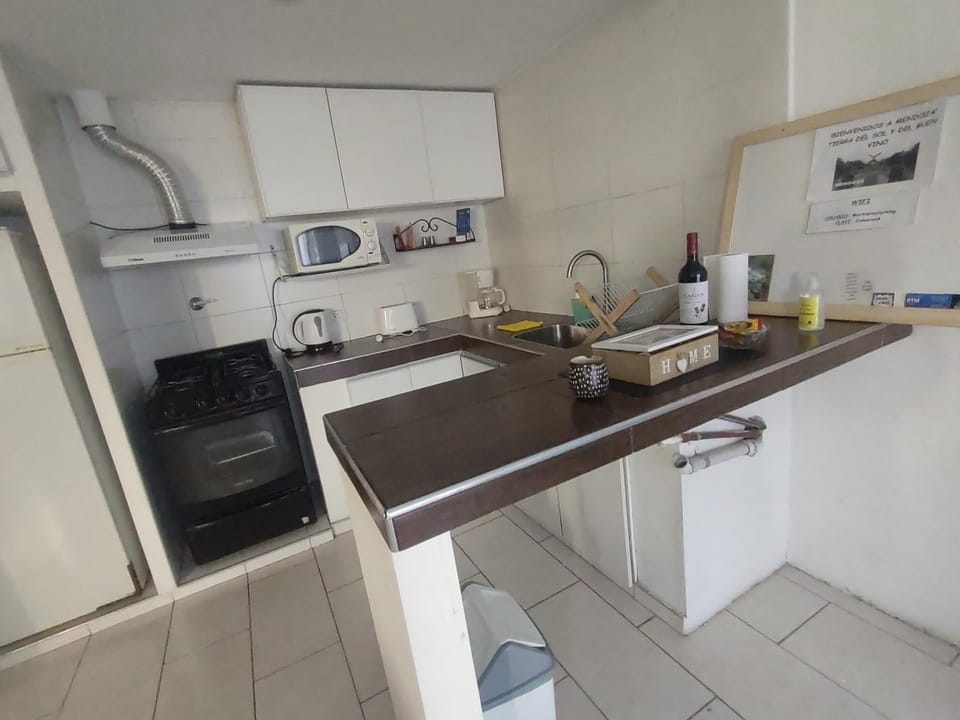 Kitchen or kitchenette, oven, toaster