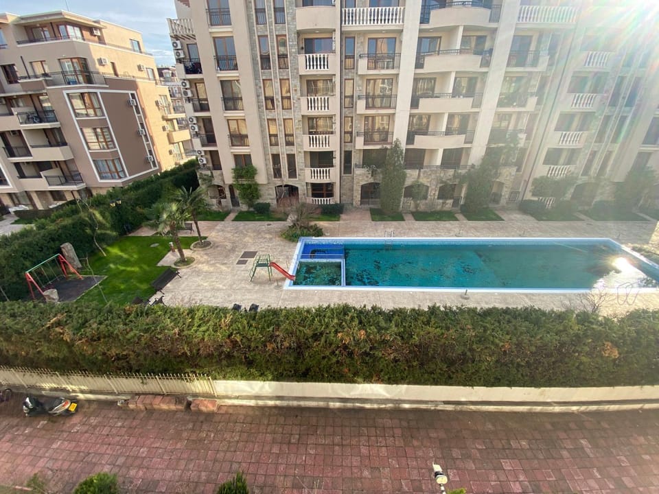 Property building, Day, Pool view, Swimming pool