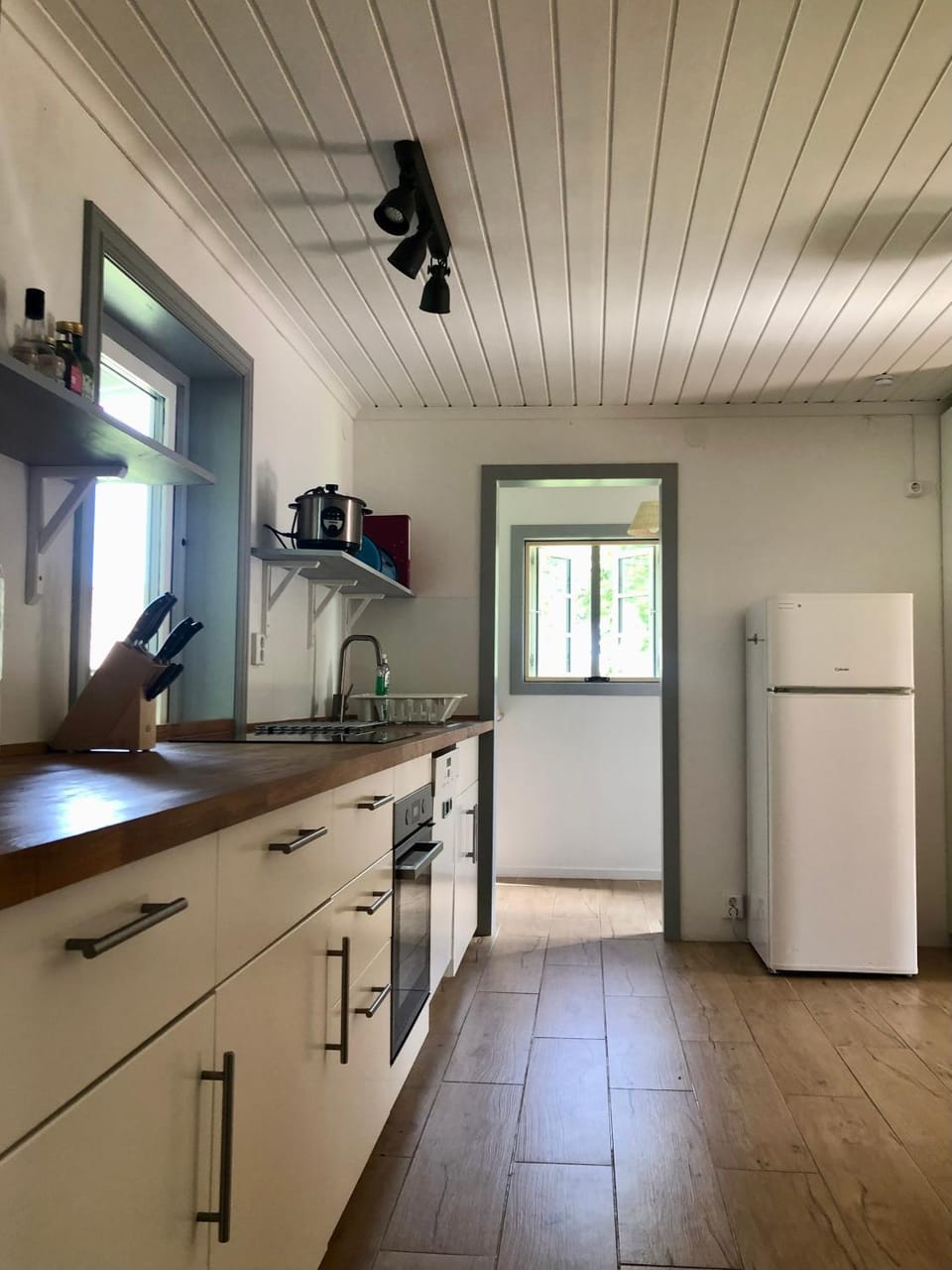 Kitchen or kitchenette, dishwasher, oven, stove