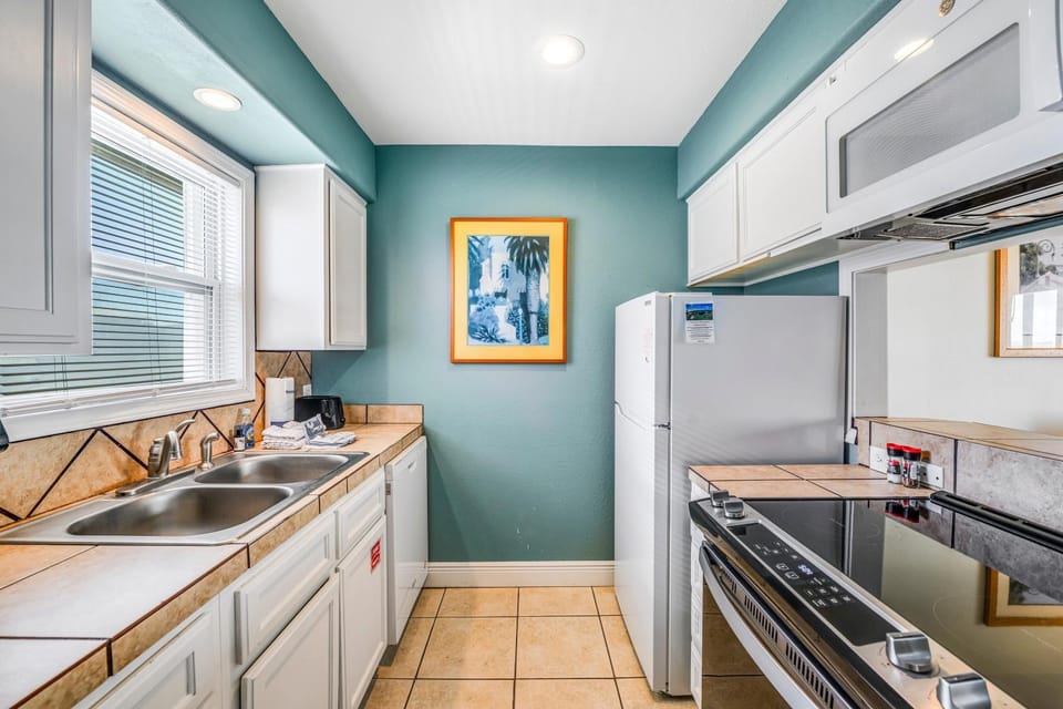 Kitchen or kitchenette, furniture, microwave, oven, stove