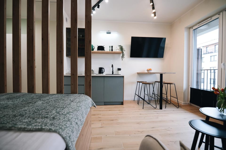 Bed, Living room, Seating area, Dining area