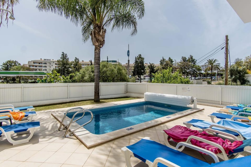 Property building, Living room, Swimming pool