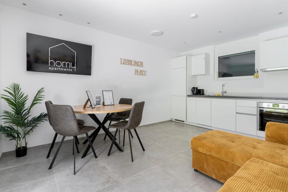 TV and multimedia, Kitchen or kitchenette, Living room, Seating area, Dining area, oven, stove