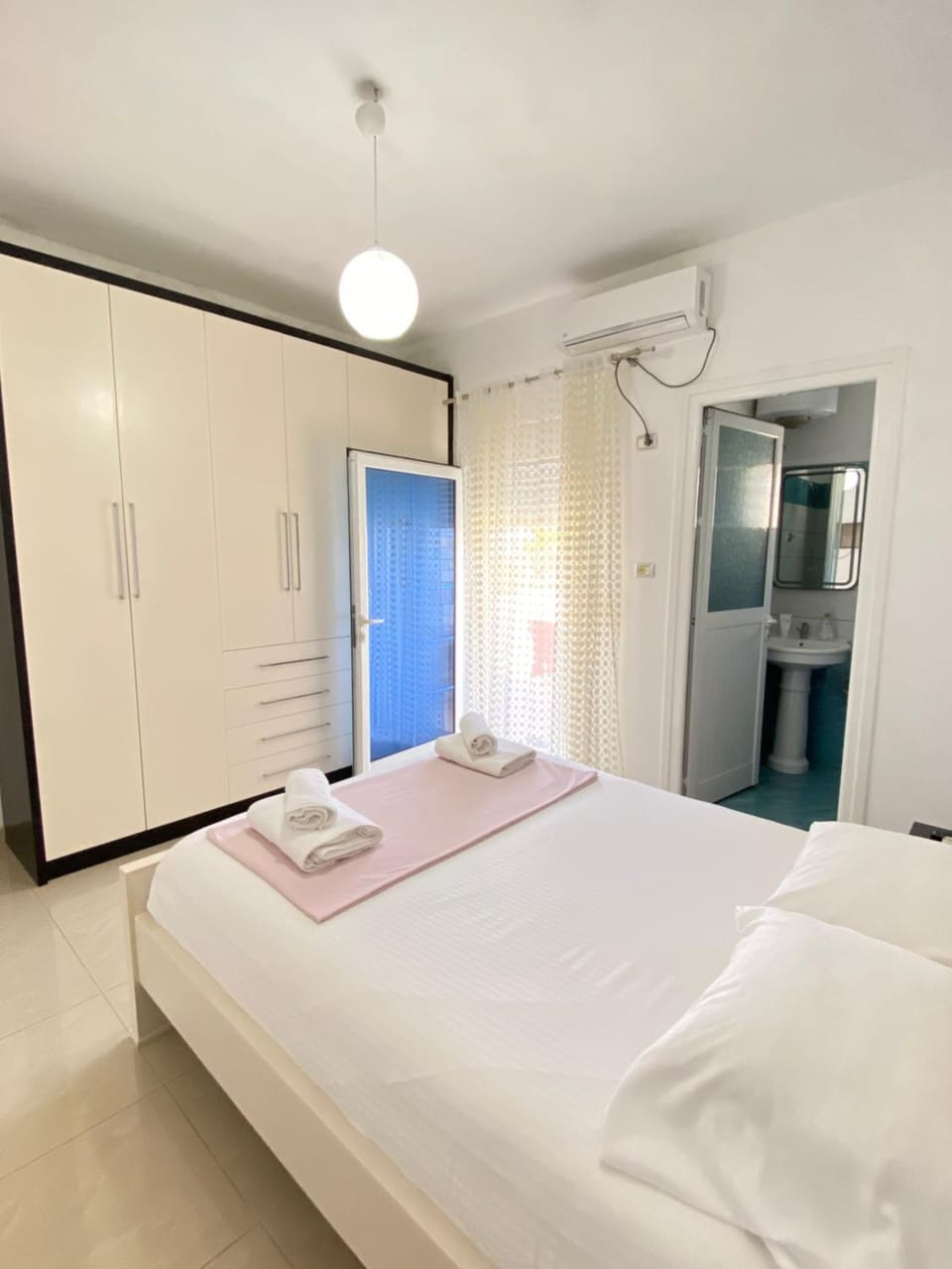 Bed, Photo of the whole room, Bedroom, towels, air conditioner